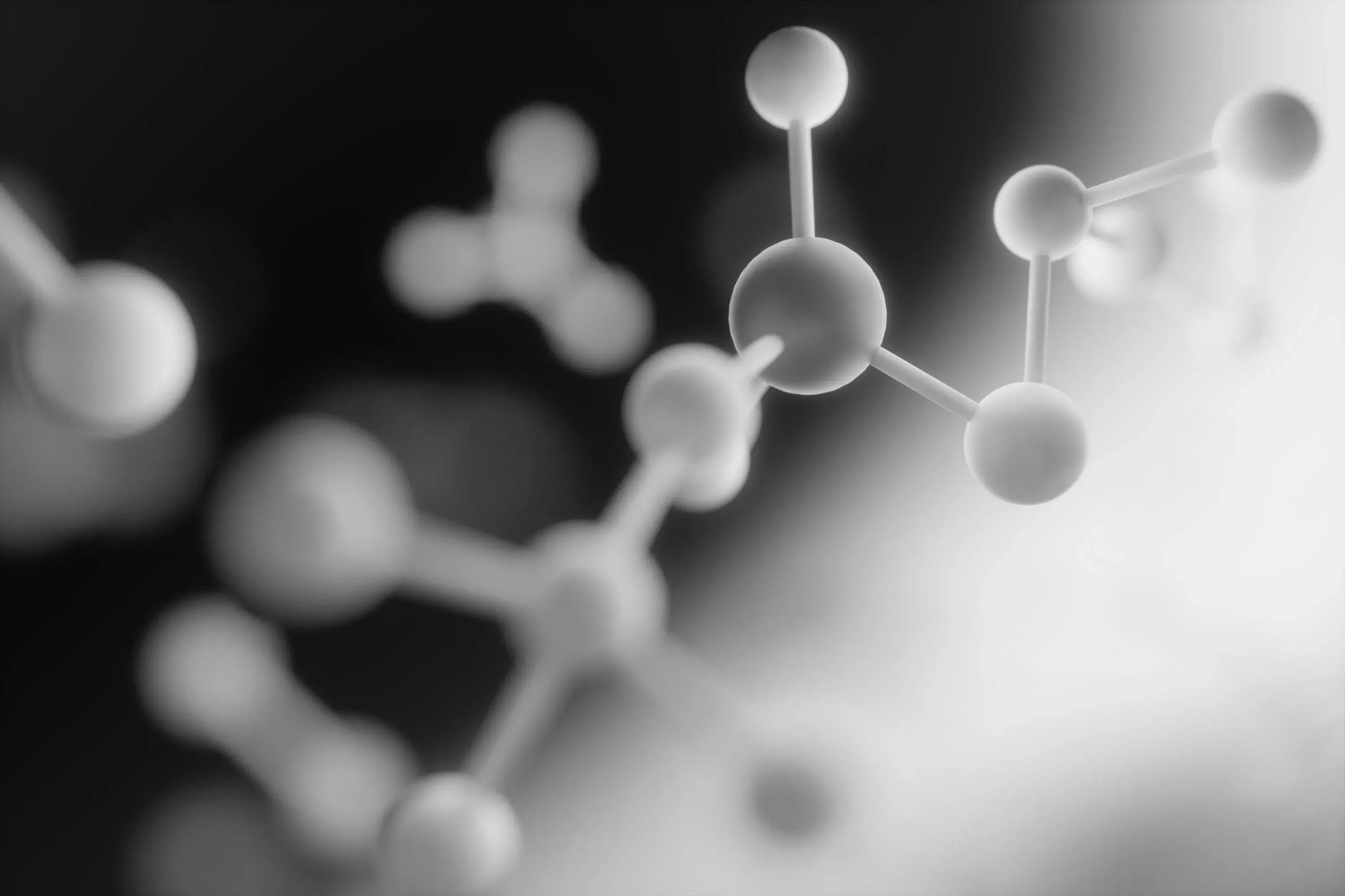 a chemical molecule in black and white